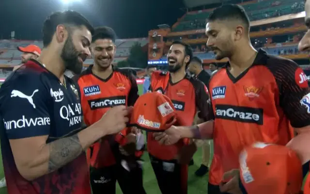 Watch: Centurion Kohli signs bat, jersey, and cap for SRH youngsters