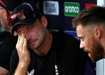 Jos Buttler supporting Australia in their final group stage match